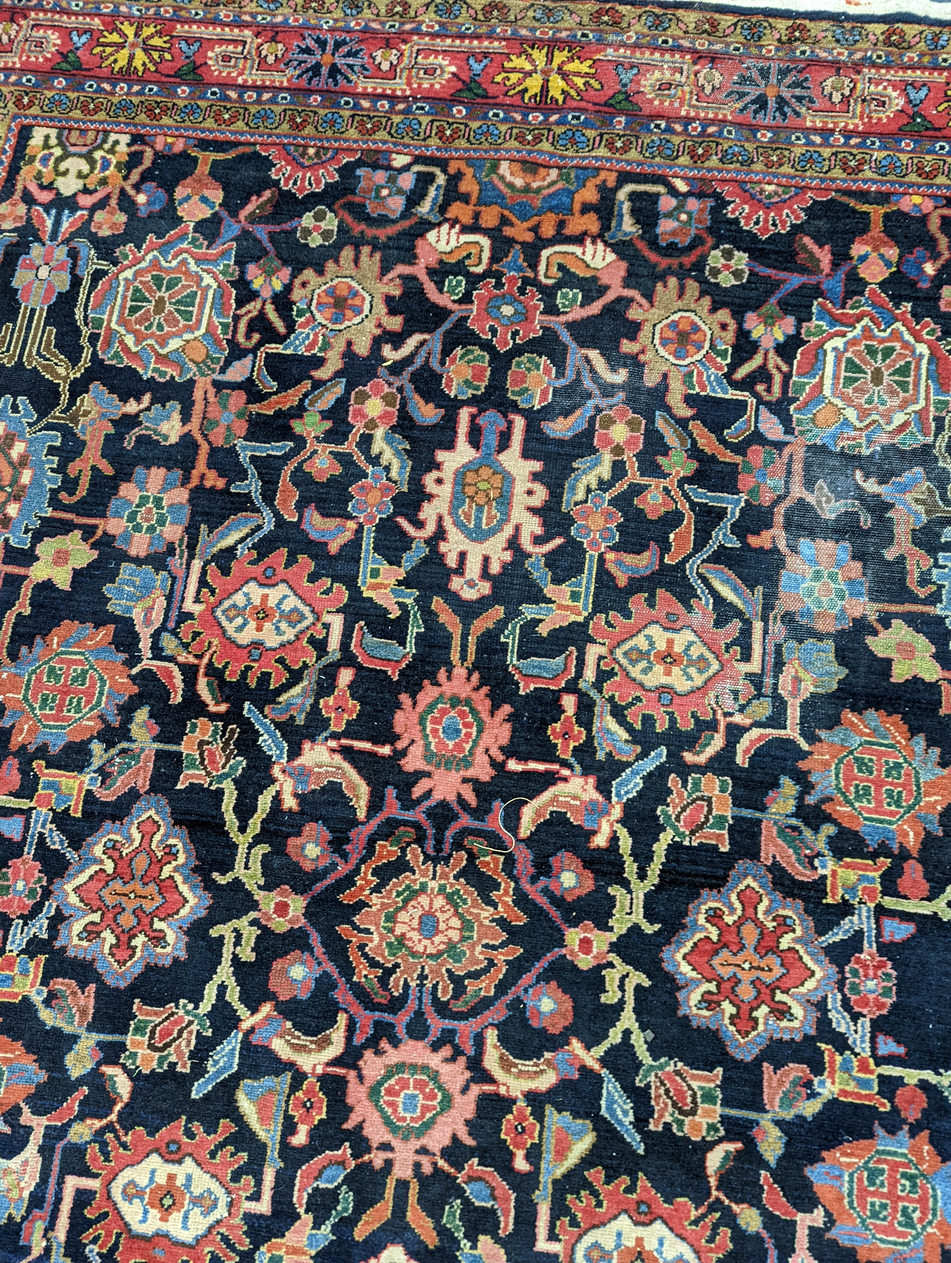 A Heriz / Moghal blue ground carpet, 340 x 206cm